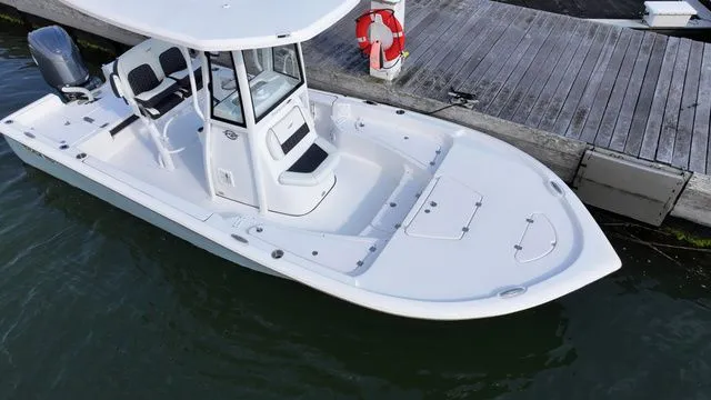 Slide: The Image of 2026 Tidewater 2210 Carolina Bay boat docked. - 3