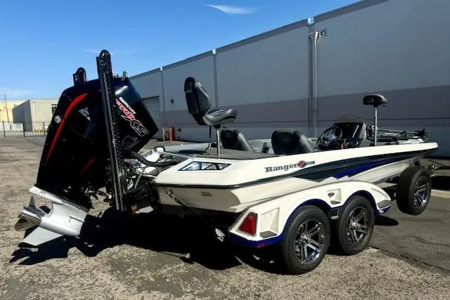 Slide: The Image of 2020 Ranger Z520L Cup-Equipped boat with powerful engine, parked outdoors. - 2