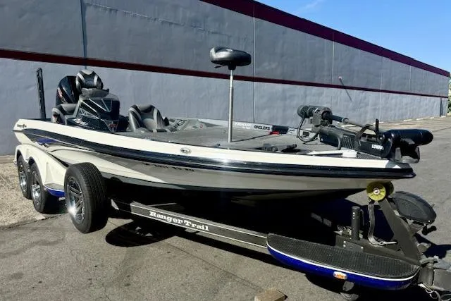 Slide: The Image of 2020 Ranger Z520L Cup-Equipped boat on trailer, parked outdoors, side view. - 3