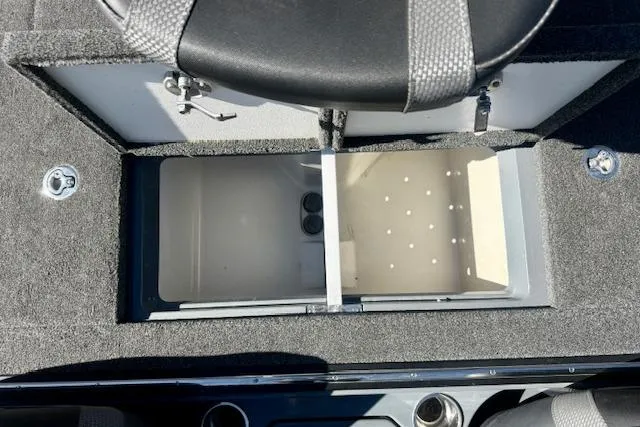 Slide: The Image of 2020 Ranger Z520L Cup-Equipped boat storage compartment with open lid and seating. - 6