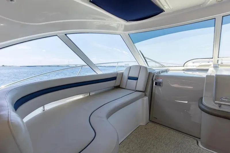 Slide: The Image of Luxurious interior of 2006 Sea Ray 48 Sundancer yacht with panoramic windows and plush seating. - 13