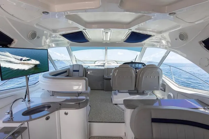 Slide: The Image of Luxurious interior of 2006 Sea Ray 48 Sundancer yacht with ocean view. - 18