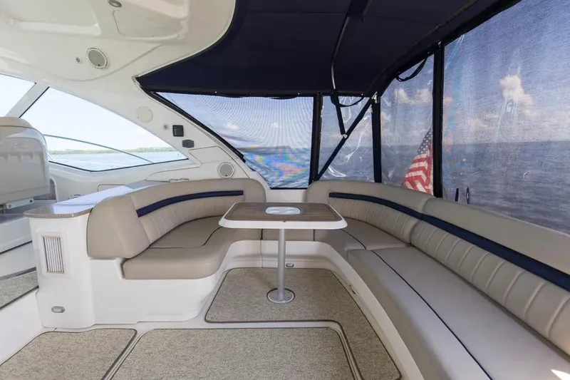 Slide: The Image of Luxurious interior of 2006 Sea Ray 48 Sundancer yacht with spacious seating and ocean view. - 7