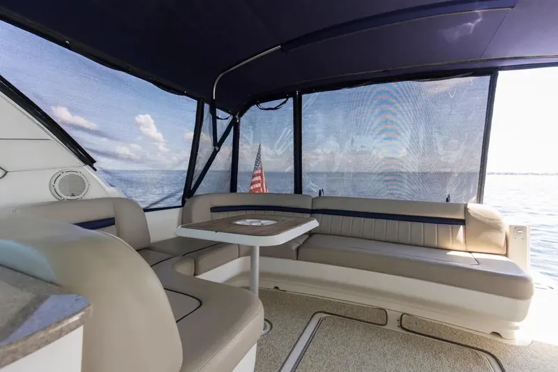 Slide: The Image of Interior of 2006 Sea Ray 48 Sundancer yacht with seating and ocean view. - 8