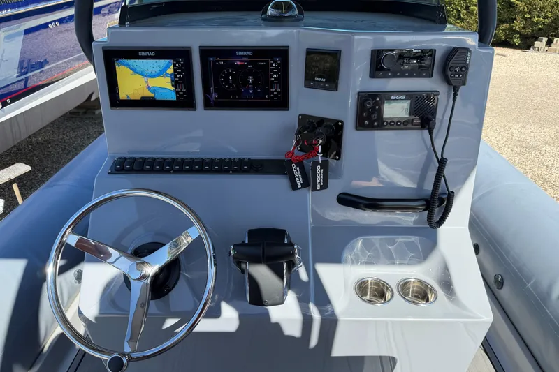 Slide: The Image of 2023 Fluid Watercraft M35 dashboard with navigation screens and controls. - 5