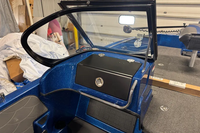 Slide: The Image of 2026 Nitro ZV19 Sport boat interior with blue finish and windshield. - 15