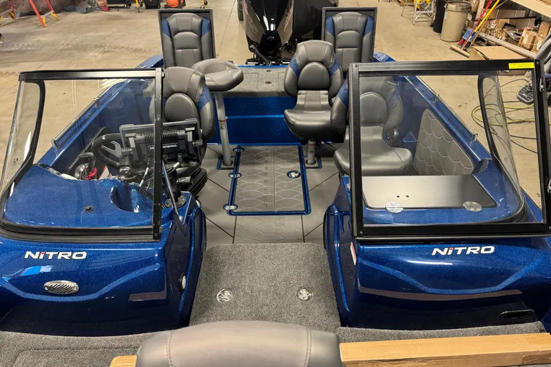 Slide: The Image of 2026 Nitro ZV19 Sport boat interior with blue finish and comfortable seating. - 6
