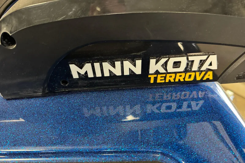 Slide: The Image of Minn Kota Terrova motor on 2026 Nitro ZV19 Sport boat, blue metallic finish. - 7