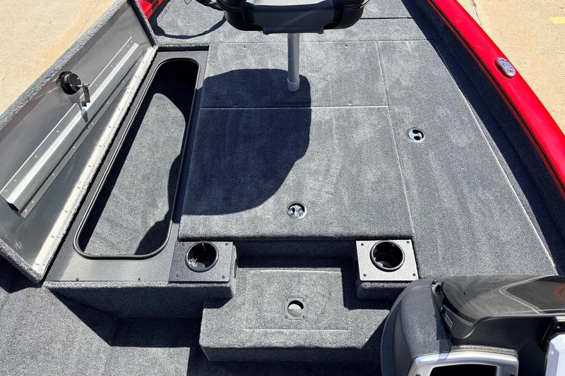 Slide: The Image of 2026 Tracker Pro Team 175 boat interior with storage compartments and cup holders. - 13