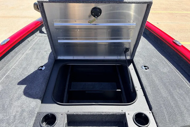 Slide: The Image of Open storage compartment on 2026 Tracker Pro Team 175 boat deck. - 15