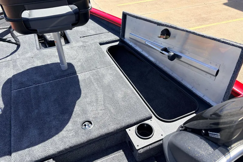 Slide: The Image of 2026 Tracker Pro Team 175 boat interior with storage compartment and seating. - 17