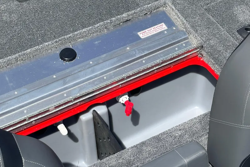 Slide: The Image of 2026 Tracker Pro Team 175 boat interior with open storage compartment. - 31