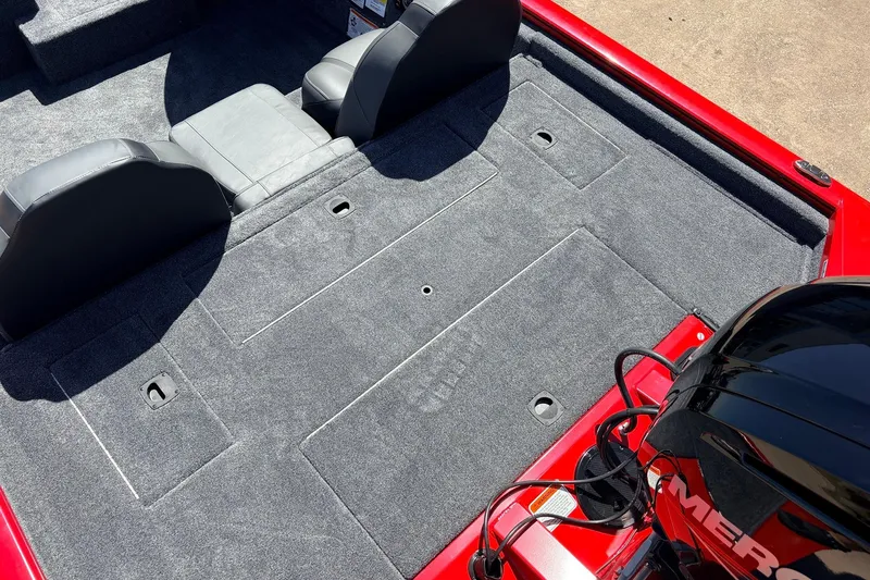 Slide: The Image of 2026 Tracker Pro Team 175 boat interior with gray seating and red accents. - 32