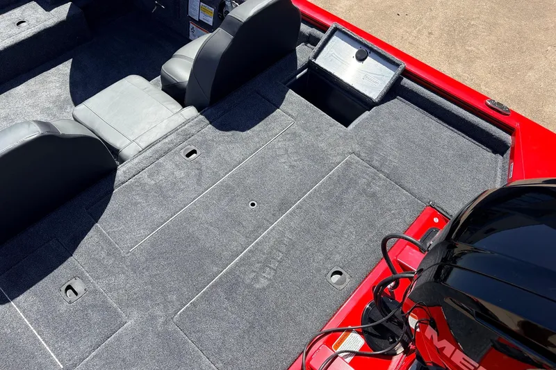 Slide: The Image of 2026 Tracker Pro Team 175 boat interior with gray seating and red accents. - 33