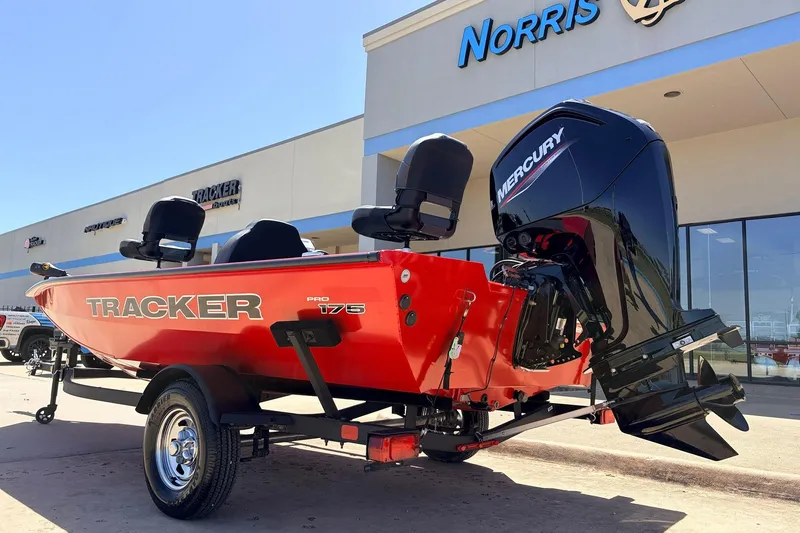 Slide: The Image of 2026 Tracker Pro Team 175 boat with Mercury engine at dealership. - 7