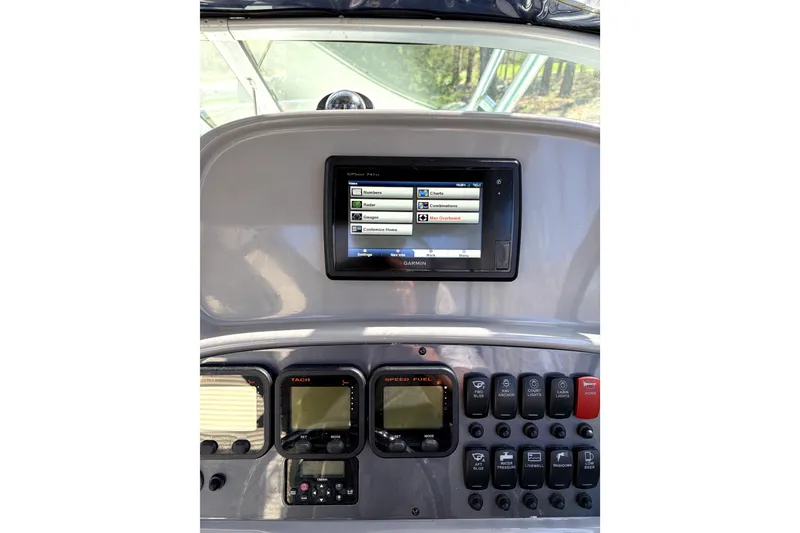 Slide: The Image of Dashboard of a 2014 Robalo R265 Walkaround with Garmin GPS and control panel. - 10