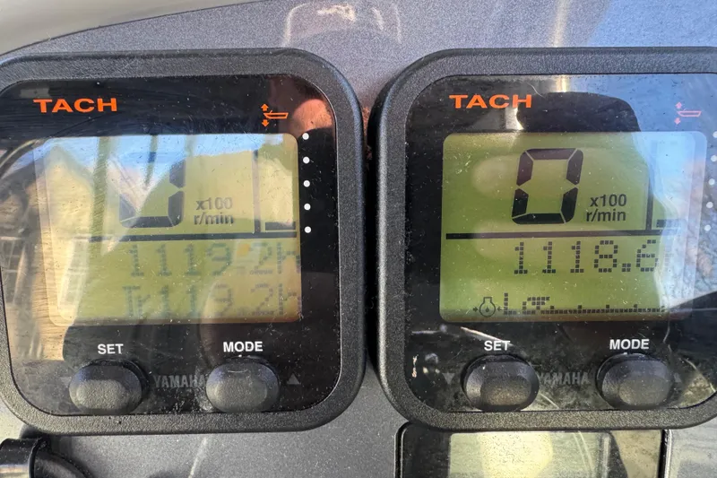 Slide: The Image of Digital tachometer display on a 2014 Robalo R265 Walkaround boat dashboard. - 9