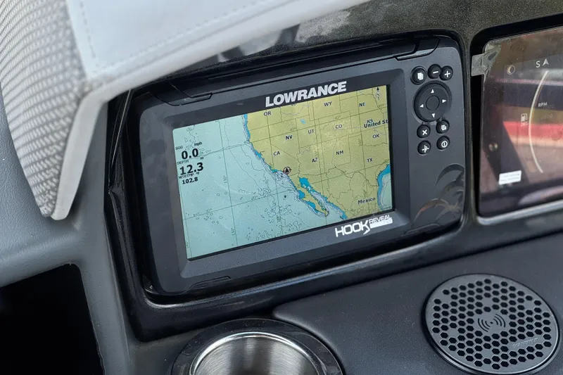 Slide: The Image of Lowrance Hook Reveal GPS on 2024 Regency 230 DL3 boat dashboard. - 27