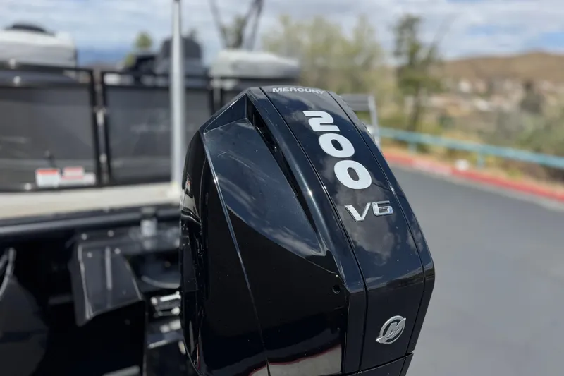 Slide: The Image of Mercury 200 V6 outboard motor on 2024 Regency 230 DL3 boat. - 8