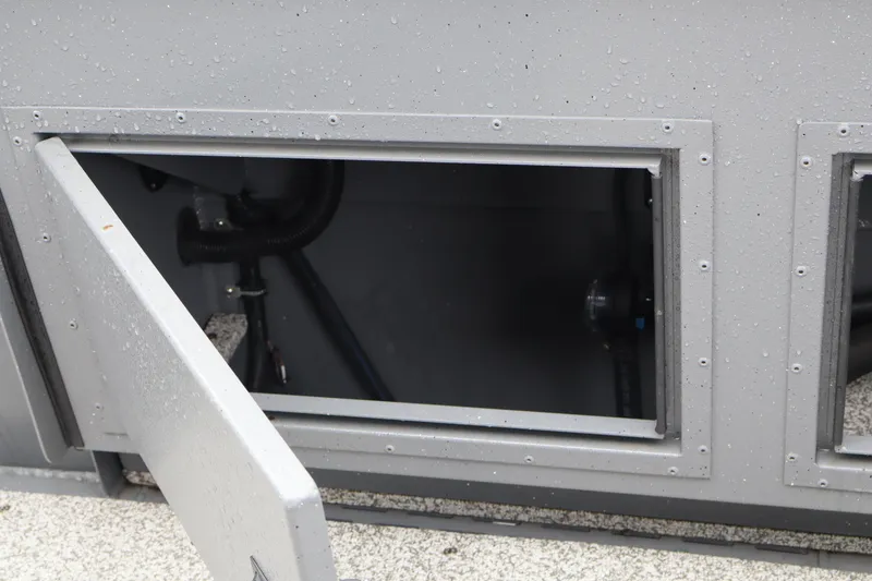 Slide: The Image of Open compartment on 2026 Alumaweld Horizon 24 boat, showing interior details and components. - 11