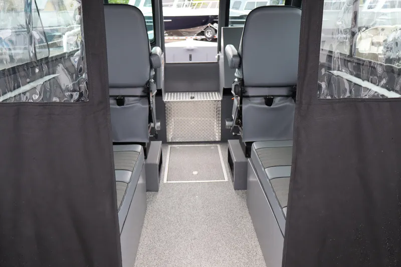 Slide: The Image of Interior of 2026 Alumaweld Horizon 24 boat with seating and windows. - 14
