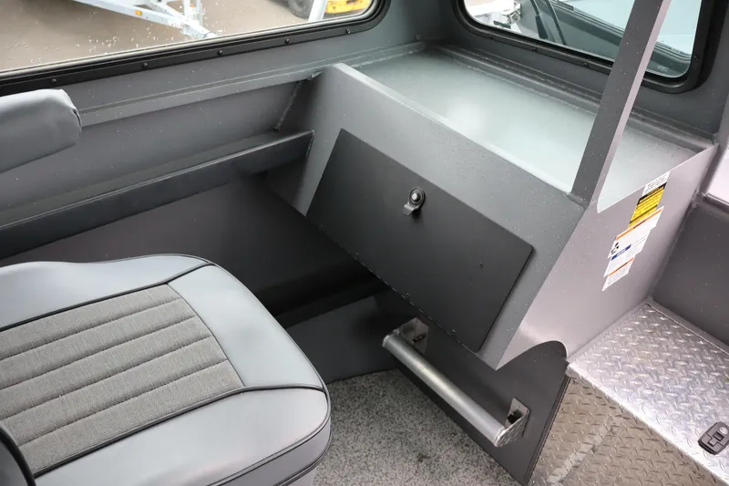 Slide: The Image of Interior of 2026 Alumaweld Horizon 24 boat with seating and storage compartment. - 19