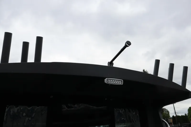 Slide: The Image of Rooftop view of 2026 Alumaweld Horizon 24 boat with rod holders and light. - 26