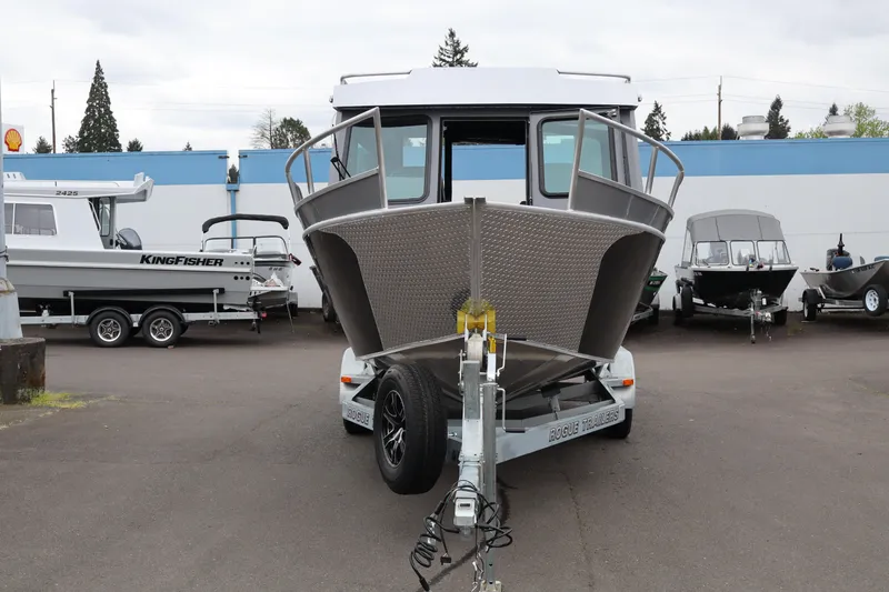Slide: The Image of 2026 Alumaweld Horizon 24 boat on trailer in dealership lot. - 3