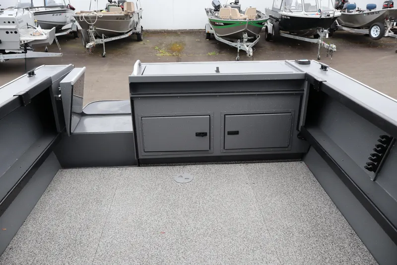 Slide: The Image of Interior view of 2026 Alumaweld Horizon 24 boat with storage compartments. - 7