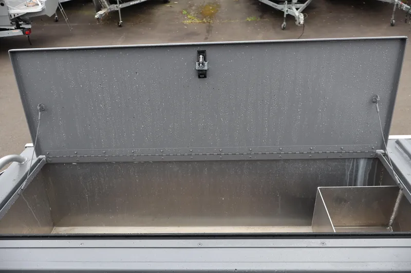 Slide: The Image of Open storage compartment of 2026 Alumaweld Horizon 24 boat, showcasing interior space. - 8