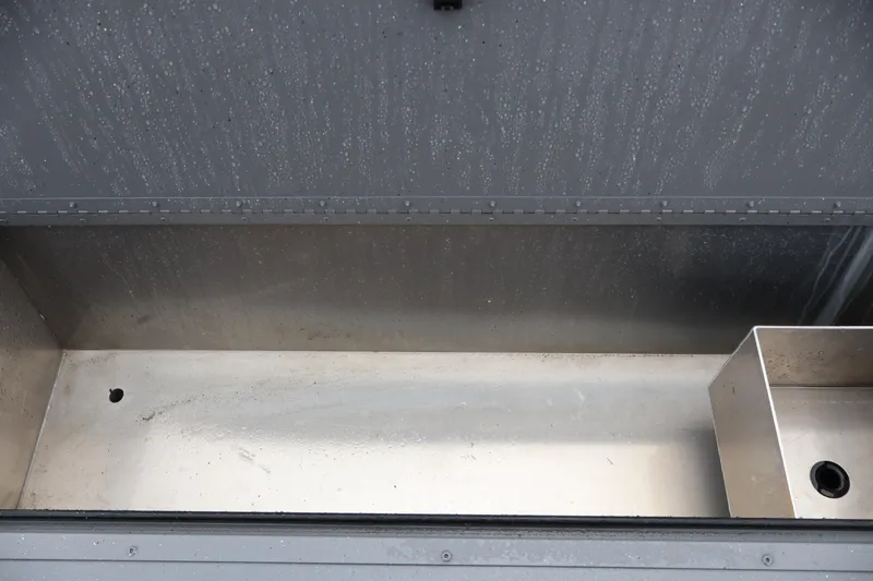 Slide: The Image of Interior view of Alumaweld Horizon 24 boat storage compartment, 2026 model. - 9