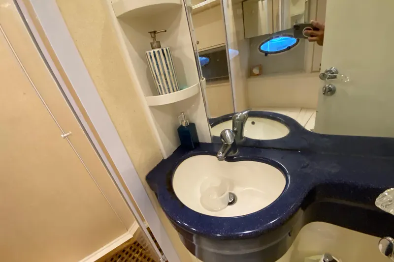Slide: The Image of Bathroom interior of 1998 Azimut 52 yacht with sink and mirror. - 44