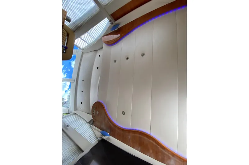 Slide: The Image of Interior view of 1998 Azimut 52 yacht with modern design and blue LED lighting. - 46