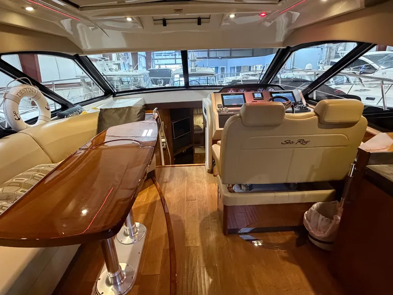 Slide: The Image of Interior of a 2015 Sea Ray Sundancer 510 yacht with luxurious cockpit. - 14