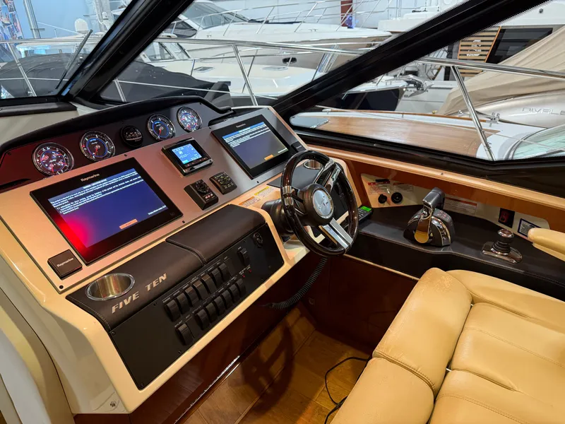 Slide: The Image of Interior view of a 2015 Sea Ray Sundancer 510 yacht cockpit. - 17