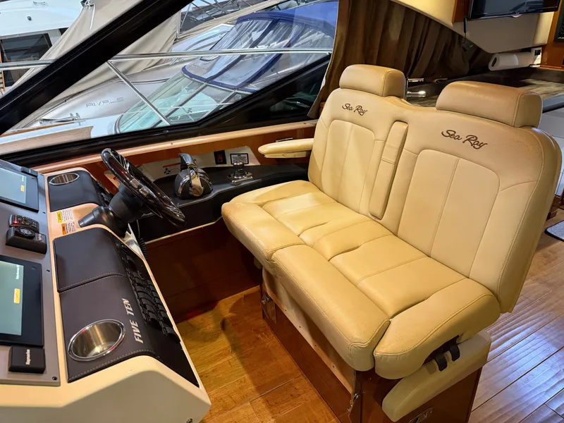 Slide: The Image of Interior of 2015 Sea Ray Sundancer 510 yacht cockpit. - 18
