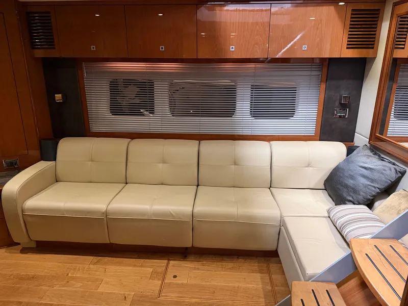 Slide: The Image of Interior of Sea Ray Sundancer 510 yacht, leather sofa, wooden floor. - 20
