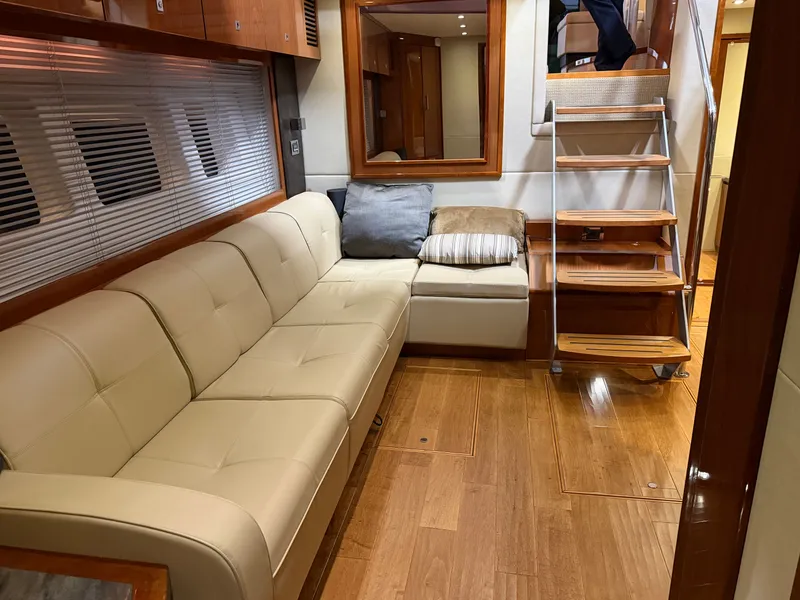 Slide: The Image of Interior of a 2015 Sea Ray Sundancer 510 yacht with leather sofa. - 27