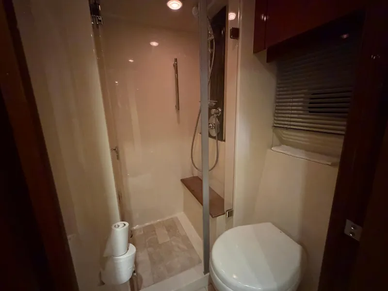 Slide: The Image of Bathroom of the 2015 Sea Ray Sundancer 510 yacht. - 33
