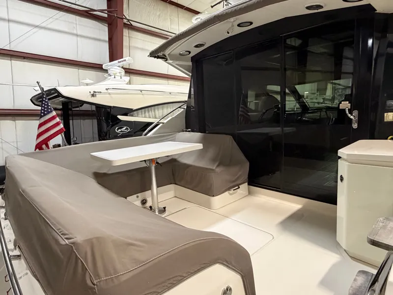 Slide: The Image of 2015 Sea Ray Sundancer 510 yacht interior with seating area. - 8