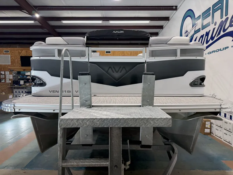 Slide: The Image of Avalon VNT VRB21 2026 pontoon boat in showroom. - 14