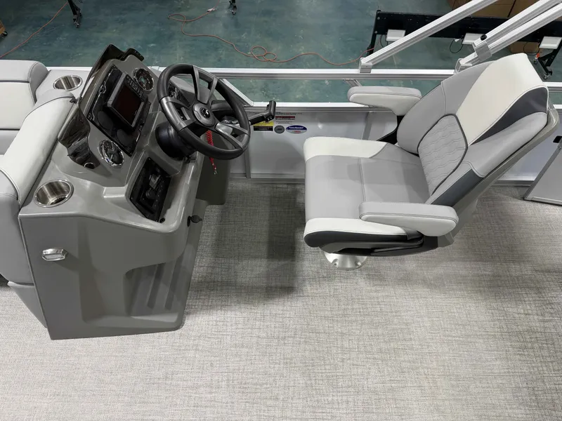 Slide: The Image of Interior of Avalon VNT VRB21 2026 with steering console and seat. - 6