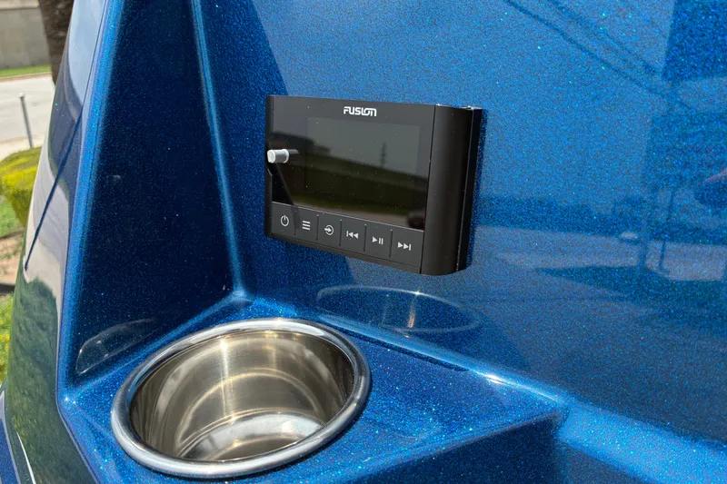 Slide: The Image of 2026 Moomba Tykon boat with Fusion stereo and stainless steel cup holder. - 11