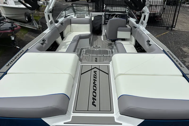 Slide: The Image of 2026 Moomba Tykon boat interior with spacious seating and modern design. - 13