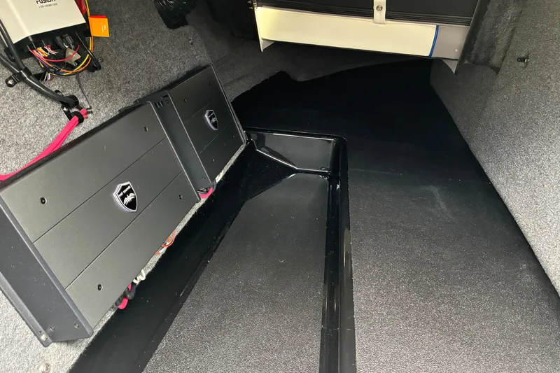 Slide: The Image of Interior view of 2026 Moomba Tykon, showcasing electronic components and wiring. - 28