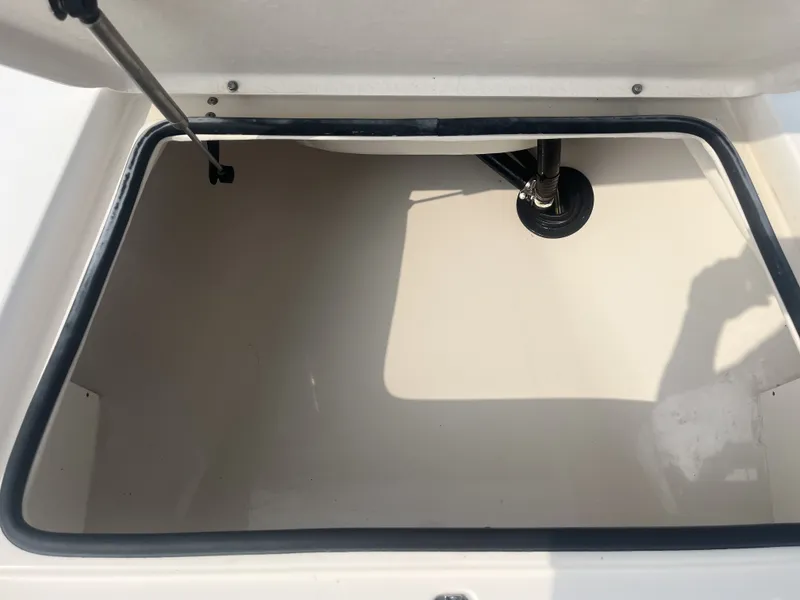 Slide: The Image of Open storage compartment in 2008 Pathfinder 2200 boat. - 10