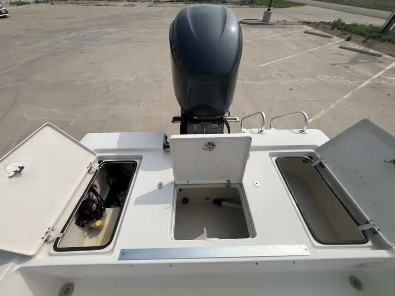 Slide: The Image of 2008 Pathfinder 2200 Tournament Edition boat with open storage compartments. - 19