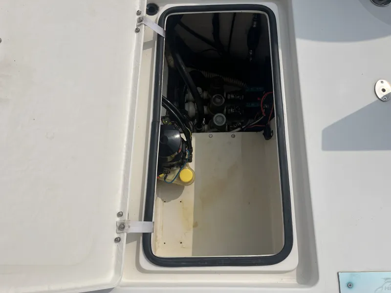 Slide: The Image of Open storage compartment in Pathfinder 2200 Tournament Edition boat. - 20