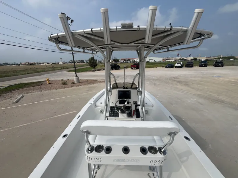 Slide: The Image of 2008 Pathfinder 2200 Tournament Edition boat in parking lot. - 23