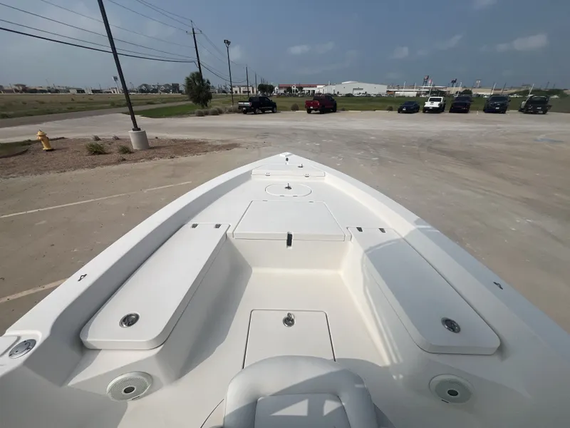 Slide: The Image of 2008 Pathfinder 2200 Tournament Edition boat on parking lot. - 27
